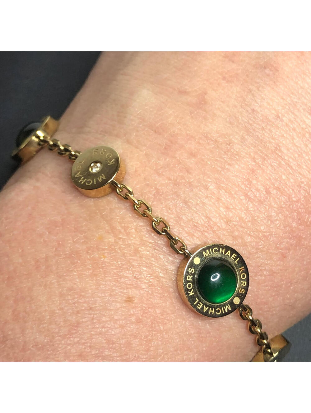 3947 Michael Kors gold tone MK Logo & Green glass station link Bracelet 7-7.5"